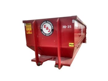 Side view of red 30 yard dumpster rental